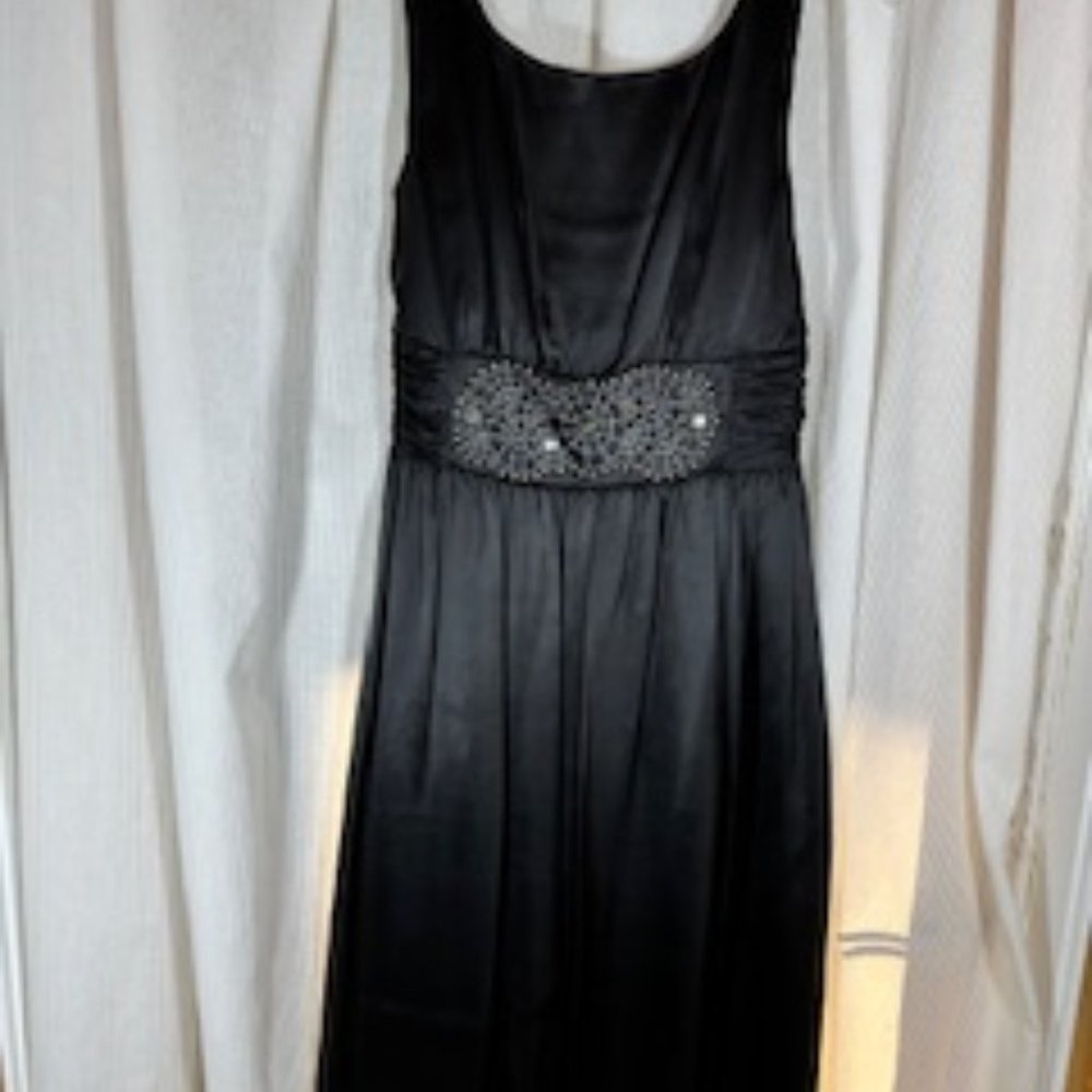 Swingy black cocktail dress with beaded details